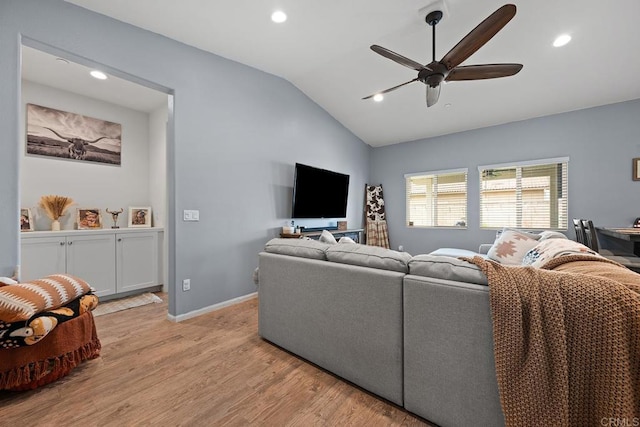 living area featuring recessed lighting, ceiling fan, light wood finished floors, and lofted ceiling