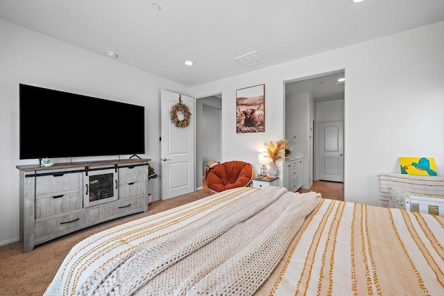 carpeted bedroom featuring recessed lighting