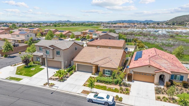 bird's eye view with a mountain view and a residential view