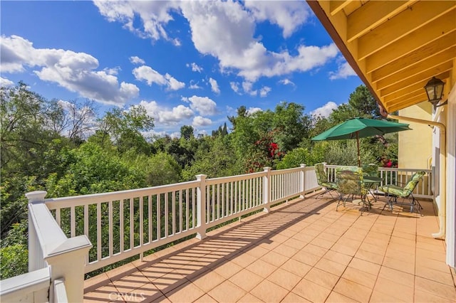 wooden deck with outdoor dining area