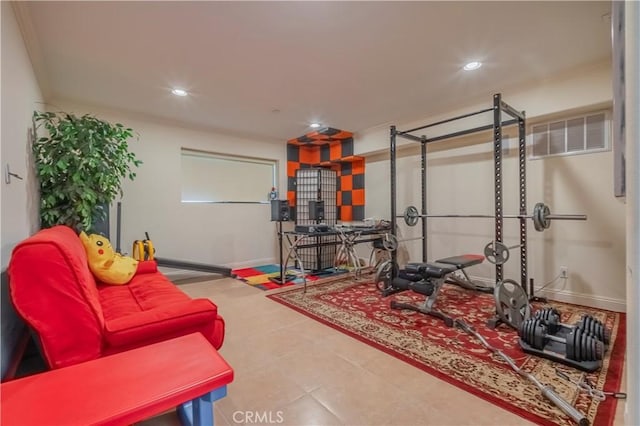 workout area with baseboards, tile patterned floors, recessed lighting, and visible vents
