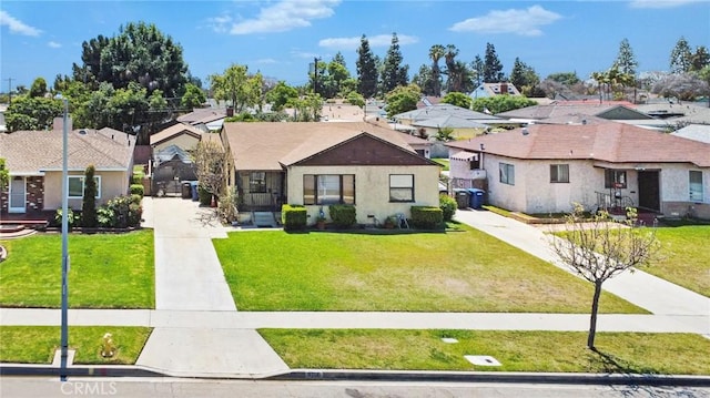 9706 Nan St, Pico Rivera, CA 90660 - ranch-style house featuring a residential view, a front lawn, and concrete driveway