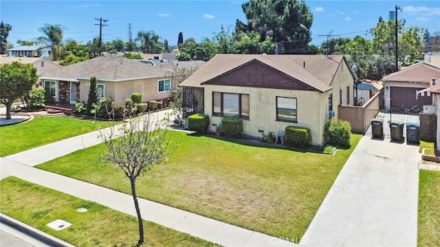 9706 Nan St, Pico Rivera, CA 90660 - ranch-style home with a front lawn, concrete driveway, and stucco siding