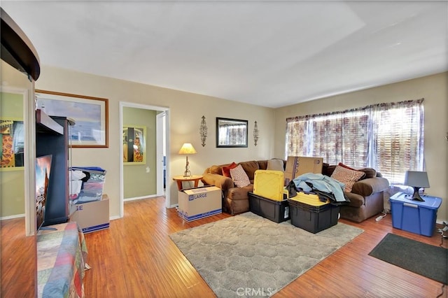 9706 Nan St, Pico Rivera, CA 90660 - living room featuring wood finished floors and baseboards