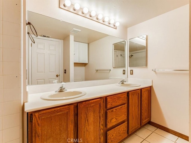 6405 Fiddleneck Ln, Avila Beach, CA 93424 - full bath featuring double vanity, tile patterned floors, and baseboards