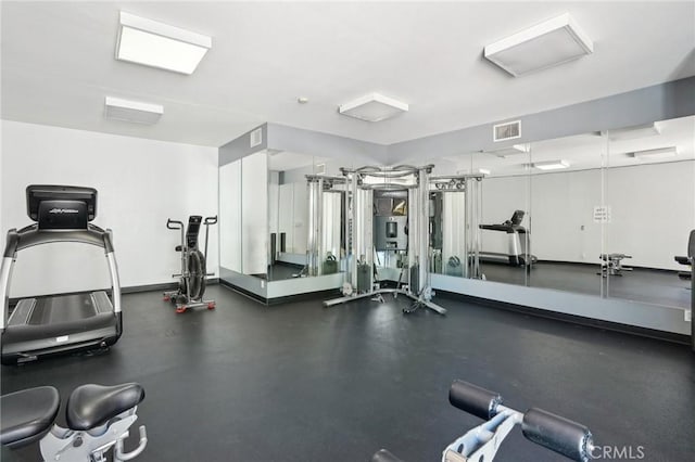 exercise room featuring visible vents