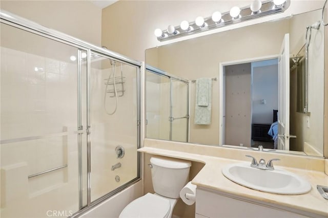 19350 Sherman Way Unit 335, Reseda, CA 91335 - ensuite bathroom featuring toilet, vanity, and enclosed tub / shower combo