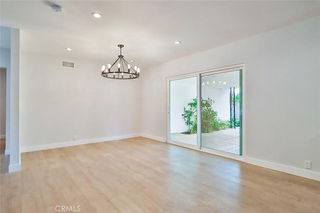 interior space with visible vents, recessed lighting, light wood finished floors, and baseboards