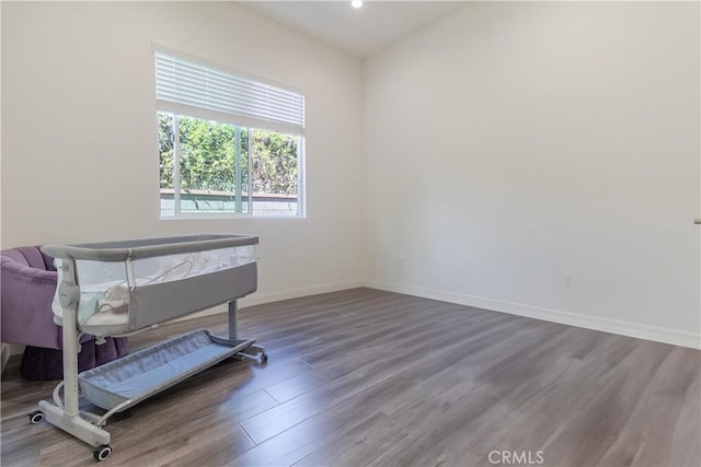 office area with baseboards, recessed lighting, and wood finished floors