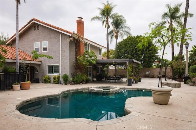 11080 Kayjay St, Riverside, CA 92503 - view of swimming pool with a patio area and a pool with connected hot tub