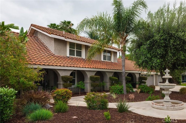 11080 Kayjay St, Riverside, CA 92503 - back of house with stucco siding and a tiled roof