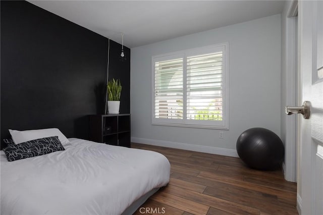 11080 Kayjay St, Riverside, CA 92503 - bedroom with baseboards and wood finished floors