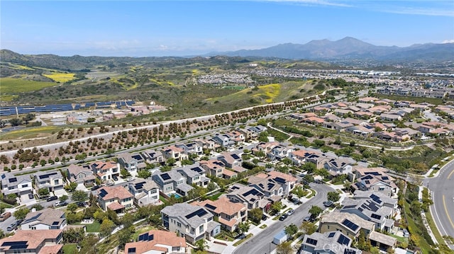 drone / aerial view with a residential view and a mountain view