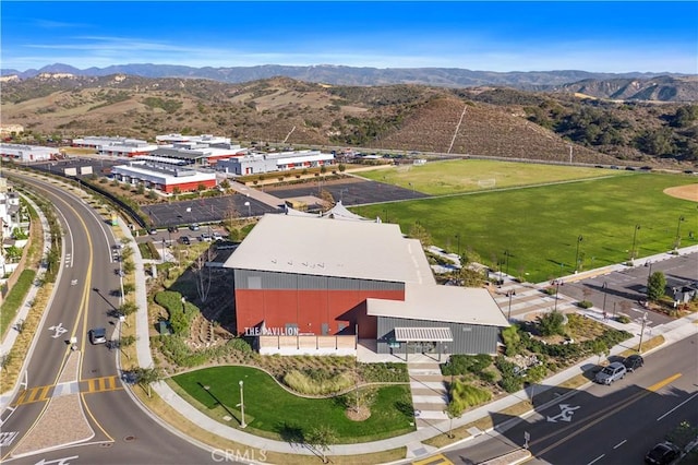 drone / aerial view featuring a mountain view