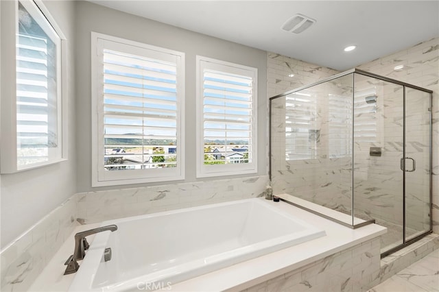 full bath featuring a shower stall, a garden tub, recessed lighting, and visible vents