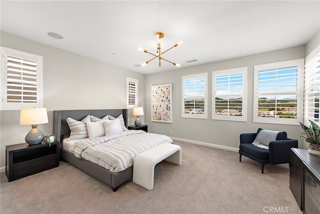 bedroom featuring baseboards, visible vents, carpet, and a notable chandelier