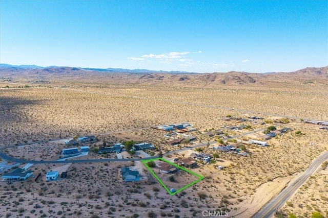 bird's eye view featuring view of desert and a mountain view