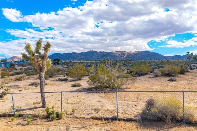 mountain view featuring a desert view