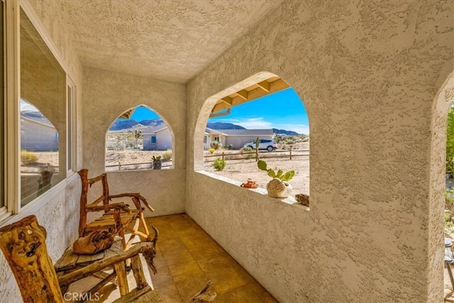 balcony featuring a mountain view