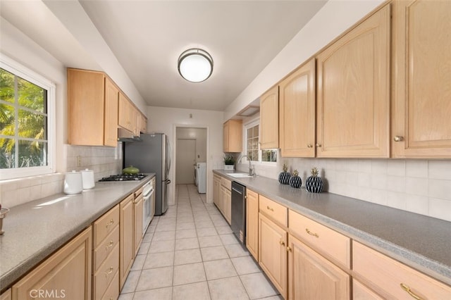kitchen featuring backsplash and light brown cabinets