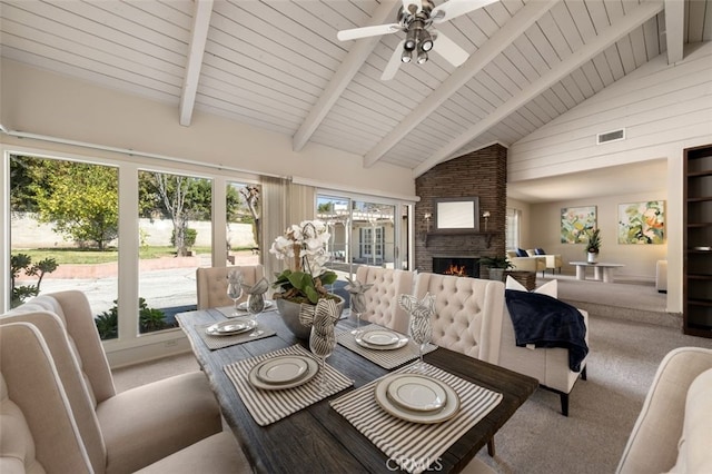 sunroom featuring visible vents and beam ceiling