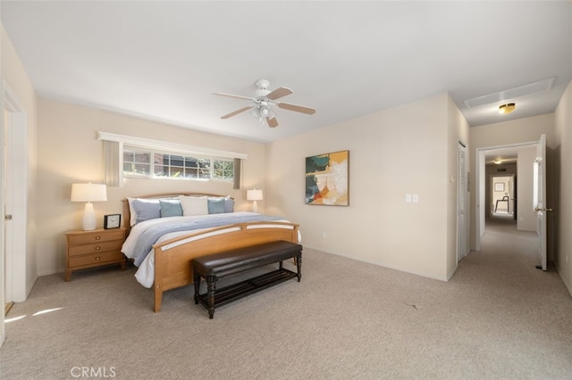 bedroom with baseboards, ceiling fan, and light carpet