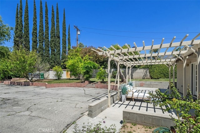 451 W Foothill Blvd, Arcadia, CA 91006 - view of patio with a pergola and a fenced backyard