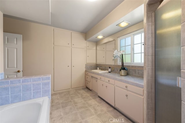 451 W Foothill Blvd, Arcadia, CA 91006 - full bathroom featuring vanity, a bath, and backsplash