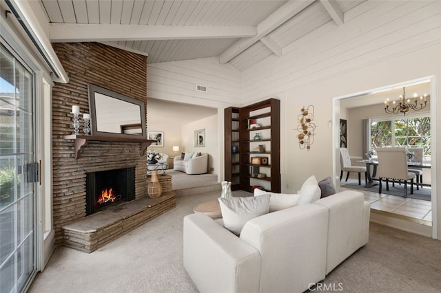 451 W Foothill Blvd, Arcadia, CA 91006 - living area with a chandelier, a stone fireplace, beam ceiling, carpet, and high vaulted ceiling