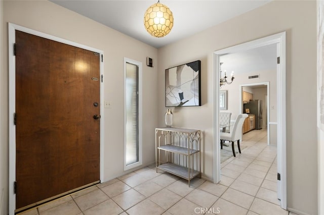 451 W Foothill Blvd, Arcadia, CA 91006 - foyer entrance with a chandelier and light tile patterned flooring