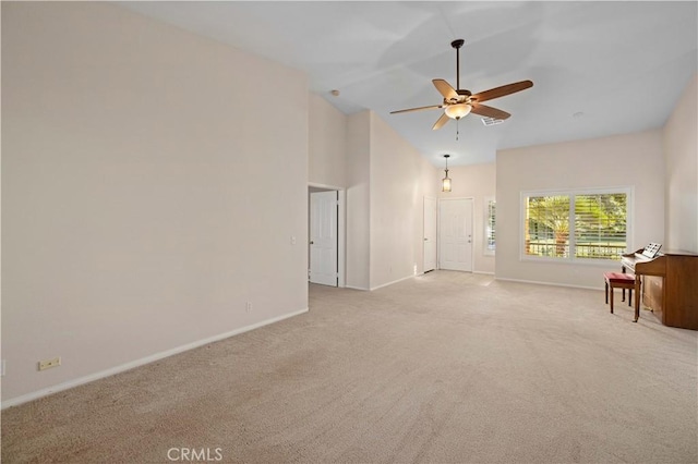 40949 Granite St, Palmdale, CA 93551 - unfurnished living room featuring carpet floors, baseboards, ceiling fan, and high vaulted ceiling