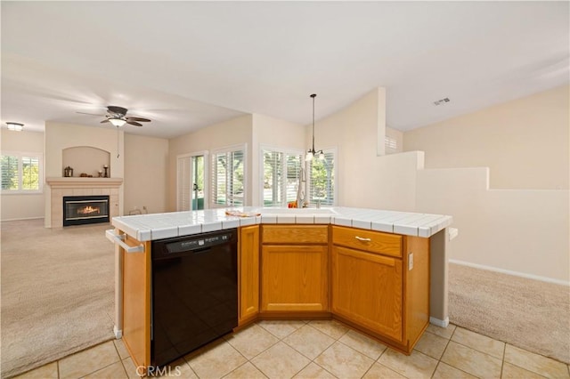 40949 Granite St, Palmdale, CA 93551 - kitchen featuring open floor plan, light colored carpet, tile countertops, a ceiling fan, and dishwasher