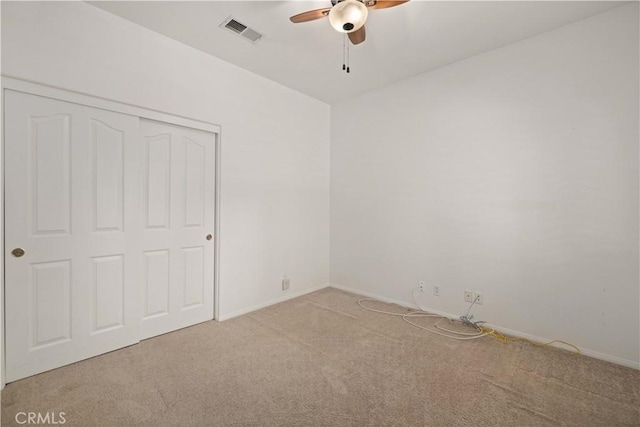 40949 Granite St, Palmdale, CA 93551 - unfurnished bedroom featuring light carpet, a closet, and ceiling fan