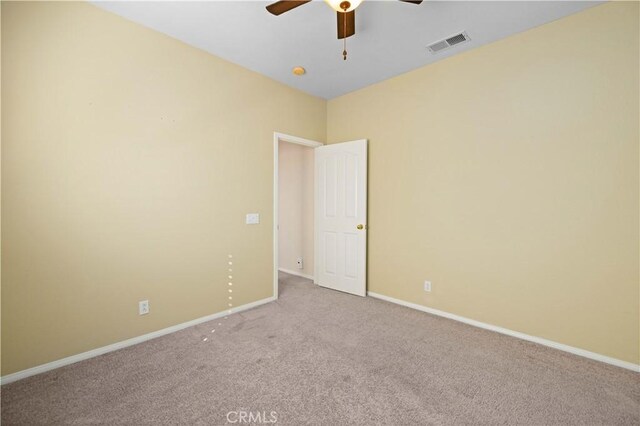 40949 Granite St, Palmdale, CA 93551 - carpeted spare room with baseboards, a ceiling fan, and visible vents