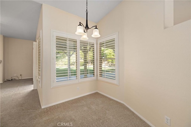 40949 Granite St, Palmdale, CA 93551 - carpeted empty room with lofted ceiling and a chandelier