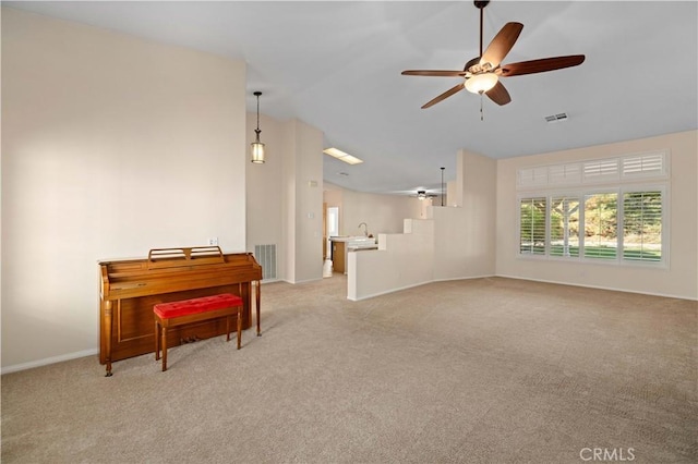 40949 Granite St, Palmdale, CA 93551 - interior space featuring a ceiling fan, visible vents, and light carpet