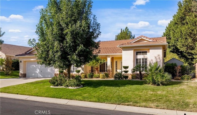 40949 Granite St, Palmdale, CA 93551 - view of front of property featuring driveway, a garage, a tile roof, and a front lawn
