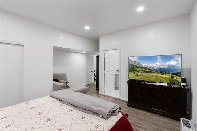 2113 Herrington Ave, San Bernardino, CA 92411 - bedroom featuring recessed lighting and wood finished floors