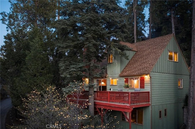278 Mittry Ln, Lake Arrowhead, CA 92352 - rear view of house featuring board and batten siding, a shingled roof, and a deck