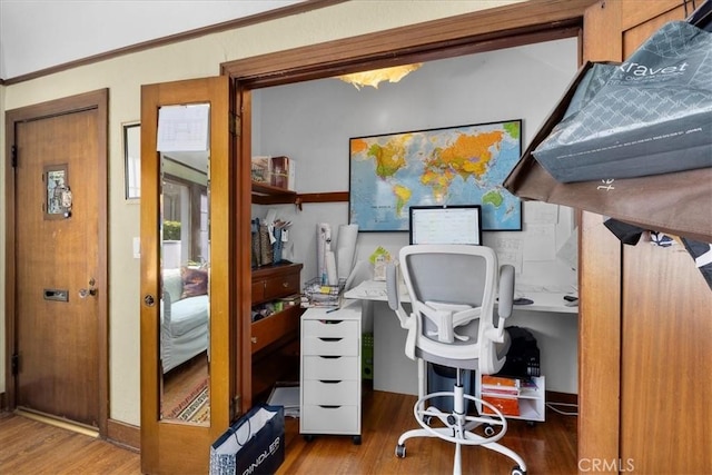 office area with wood finished floors