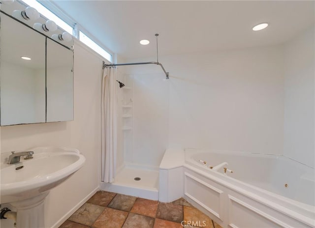 21122 Amberwick Ln, Huntington Beach, CA 92646 - full bathroom featuring a shower with curtain, a sink, a whirlpool tub, stone finish floor, and baseboards