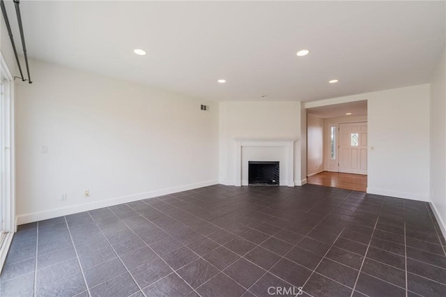 21122 Amberwick Ln, Huntington Beach, CA 92646 - unfurnished living room featuring visible vents, a fireplace, baseboards, and recessed lighting
