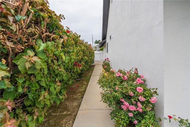 21122 Amberwick Ln, Huntington Beach, CA 92646 - view of home's exterior featuring stucco siding and fence