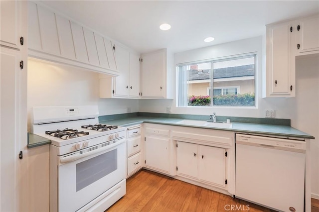21122 Amberwick Ln, Huntington Beach, CA 92646 - kitchen with a sink, white appliances, recessed lighting, light wood-style flooring, and white cabinetry