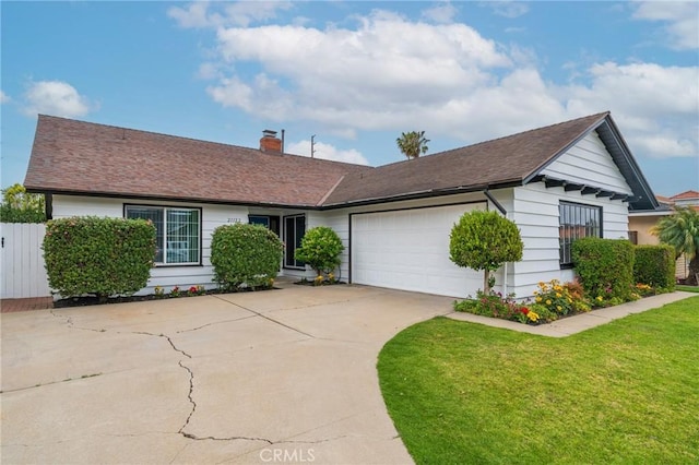 21122 Amberwick Ln, Huntington Beach, CA 92646 - ranch-style home featuring a garage, a chimney, fence, concrete driveway, and a front yard