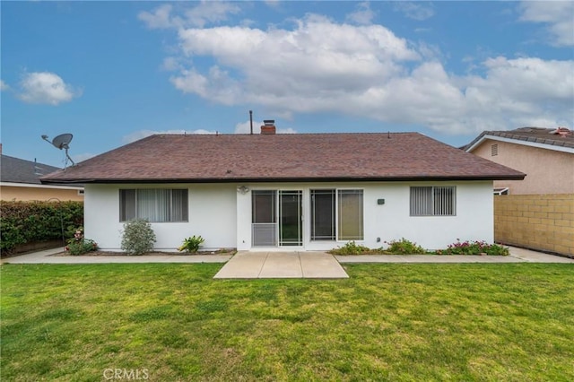 21122 Amberwick Ln, Huntington Beach, CA 92646 - back of property featuring a yard, stucco siding, and fence