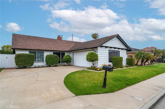21122 Amberwick Ln, Huntington Beach, CA 92646 - ranch-style house featuring fence, concrete driveway, a garage, a front yard, and a chimney