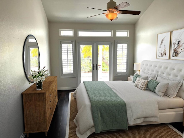 bedroom featuring access to exterior, french doors, a ceiling fan, baseboards, and dark wood-type flooring