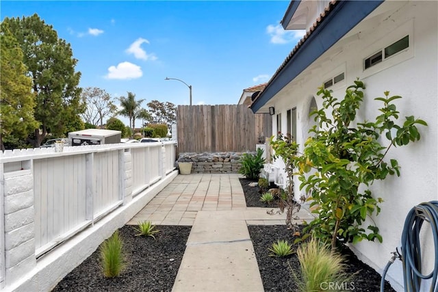 615 Calle Campana, San Clemente, CA 92673 - view of home's exterior featuring stucco siding, a patio area, and fence