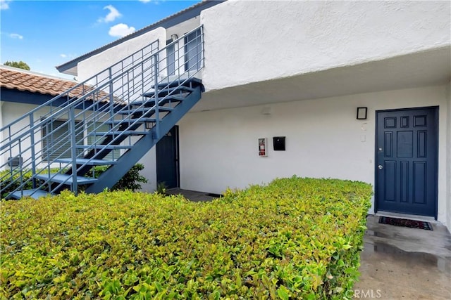 615 Calle Campana, San Clemente, CA 92673 - property entrance featuring a tiled roof and stucco siding